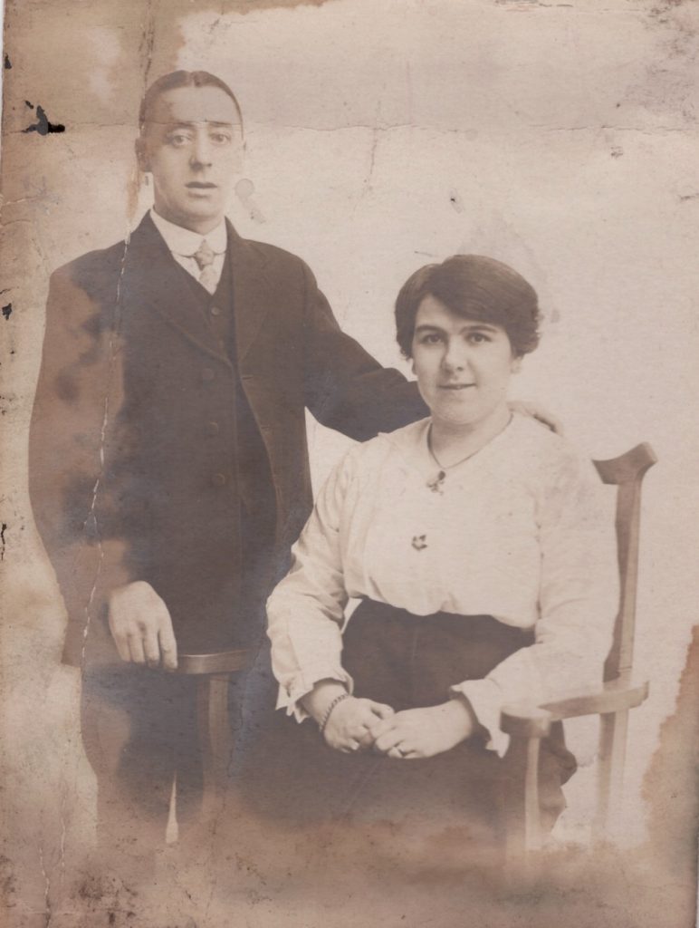 Preserving family photos and documents. A water damaged photo of a married couple